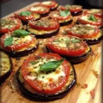 Minipizzas de Berenjena, Tomate Cherry y Mozzarella: El Aperitivo Saludable y Delicioso 4 Minipizzas de Berenjena, Tomate Cherry y Mozzarella: El Aperitivo Saludable y Delicioso