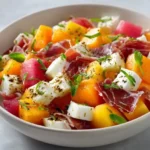Ensalada de Melón, Mango y Queso Fresco con Virutas de Jamón Ibérico